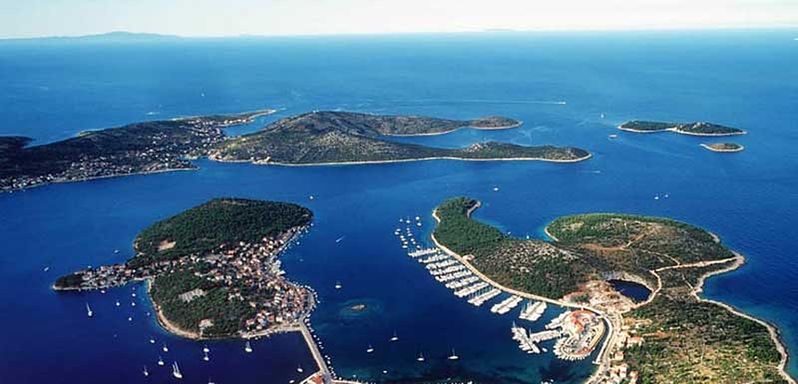 Aerial view of the Dalmatian coast with islands and a marina